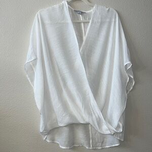 Lightweight gauzy flowy white semi sheer blouse. Size medium EUC